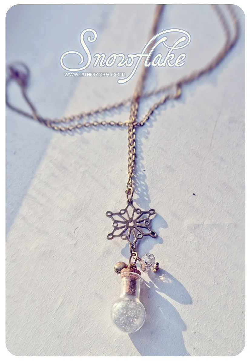 Snow and snowflake vial pendant necklace