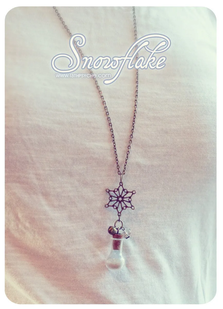 Snow and snowflake vial pendant necklace