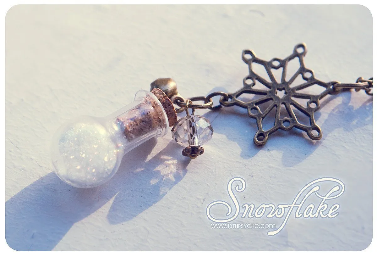 Snow and snowflake vial pendant necklace