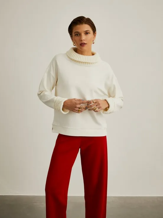 Turtleneck sweater with knitted mesh